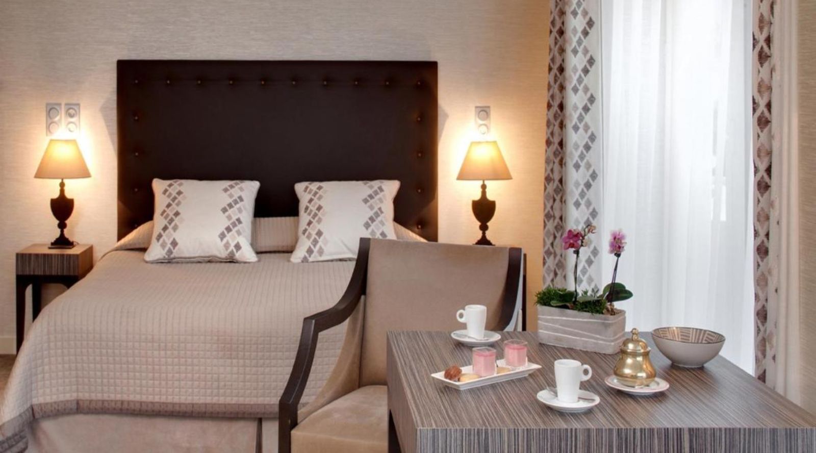 The hotel bedrooms are bright, airy, and most have small balconies overlooking t